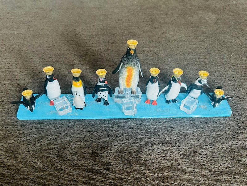 Penguin Hanukkah Menorah (12" x 2" x 4")