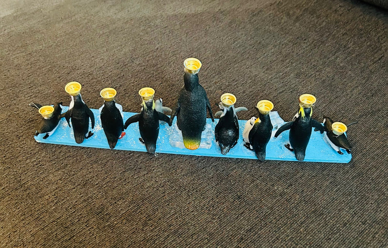 Penguin Hanukkah Menorah (12" x 2" x 4")