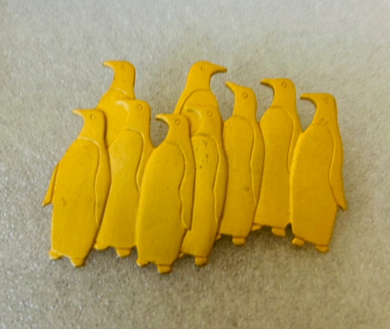 Nine Penguins Gold Plated Brooch (2 1/2" x 1 1/2")