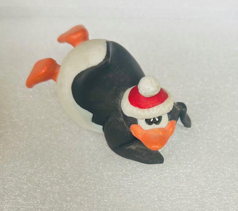 Santa Penguin Belly Slider Figurine ( 2 1/2" long)