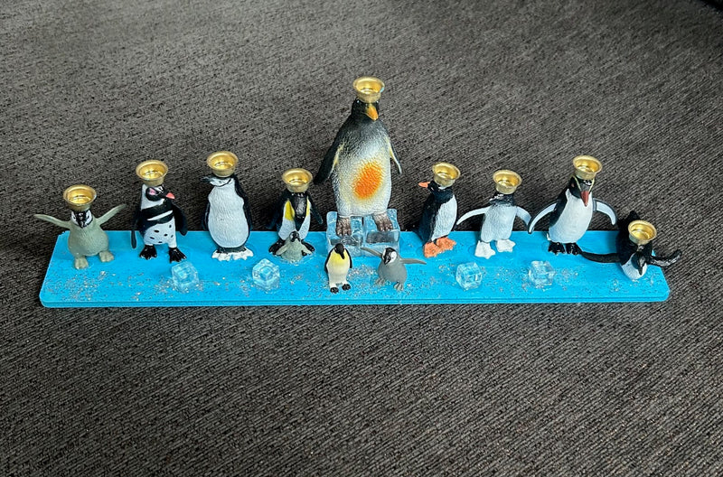 Penguin Hanukkah Menorah (12" x 2 1/2" x 4")