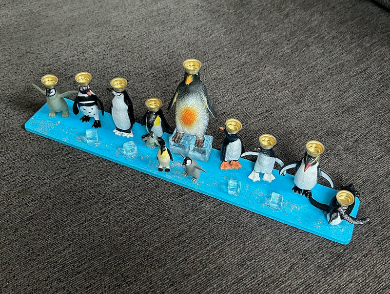 Penguin Hanukkah Menorah (12" x 2 1/2" x 4")