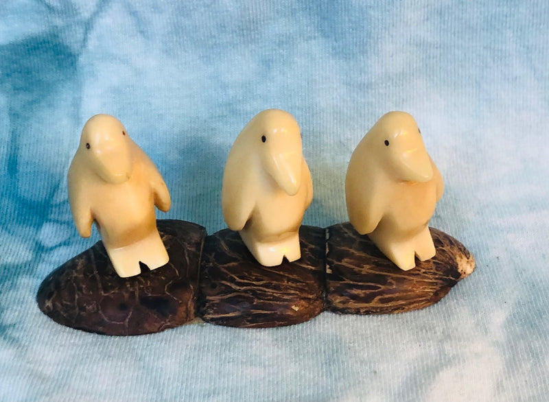 Hand Crafted Tagua Ivory Penguin Trio on Base (3 1/2" long)